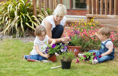 Seasonal planting and shrub care in a Woodside Park garden